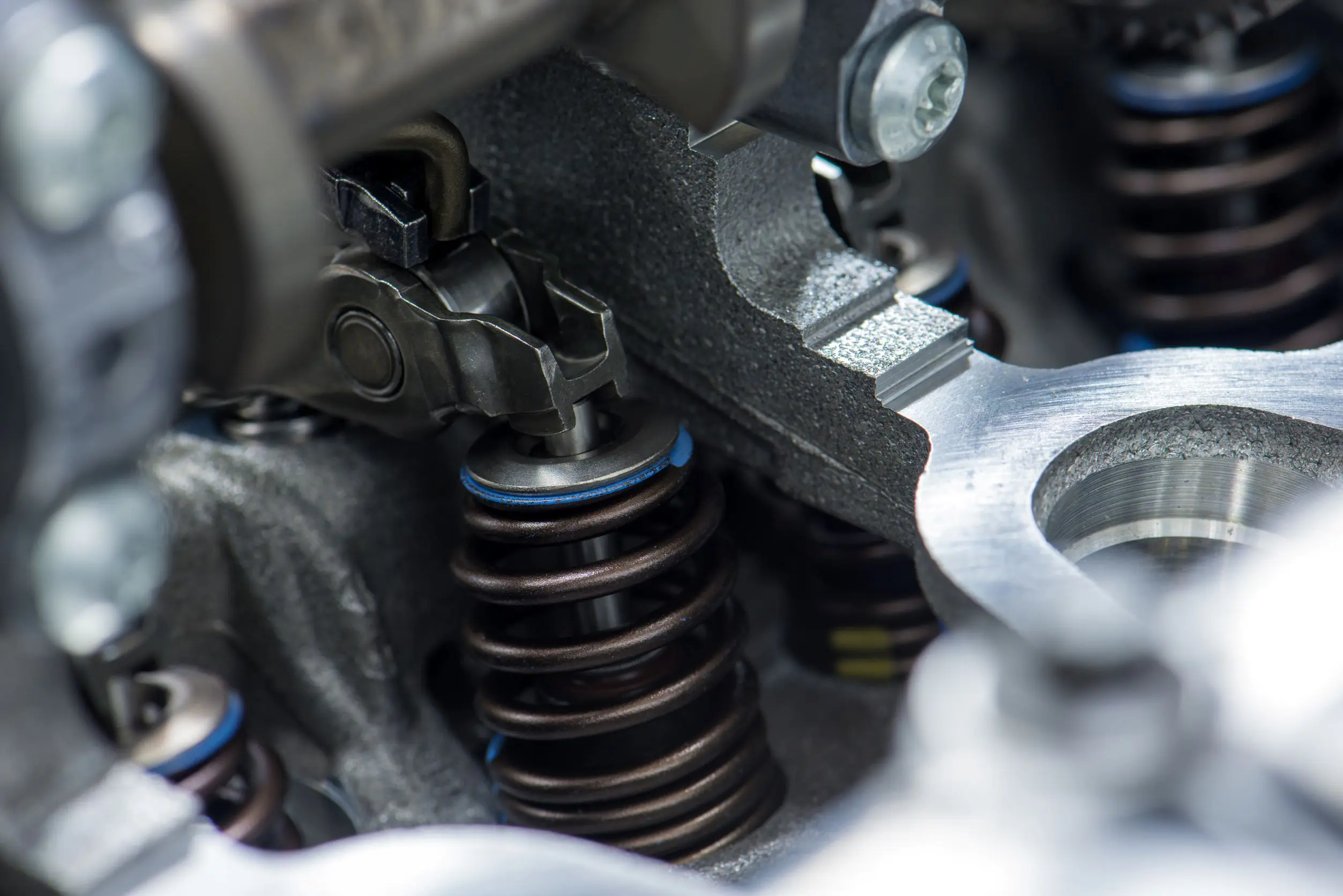 The use of beam springs vs. compression springs, as represented in this image, is among the benefits of our self-locking technology.