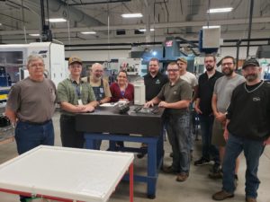 Participants of a recent internal design, manufacturing, and tool management workshop include Tom Ziembo (left), tool room; Logan Geary, engineering intern; Tim Kabat, tool room; Sarah McKillip, product engineer; Eric Schrage, product engineer; Caleb Averill, engineering manager, HS; Tony Budzinski (back), tool room; Ben Hyuck, team leader, creep feed grind; Paul Bricker, creep feed operator; and Brad Prause, process engineer. Tool design engineers Norm Adamic and Jim Szura, not pictured, also attended.